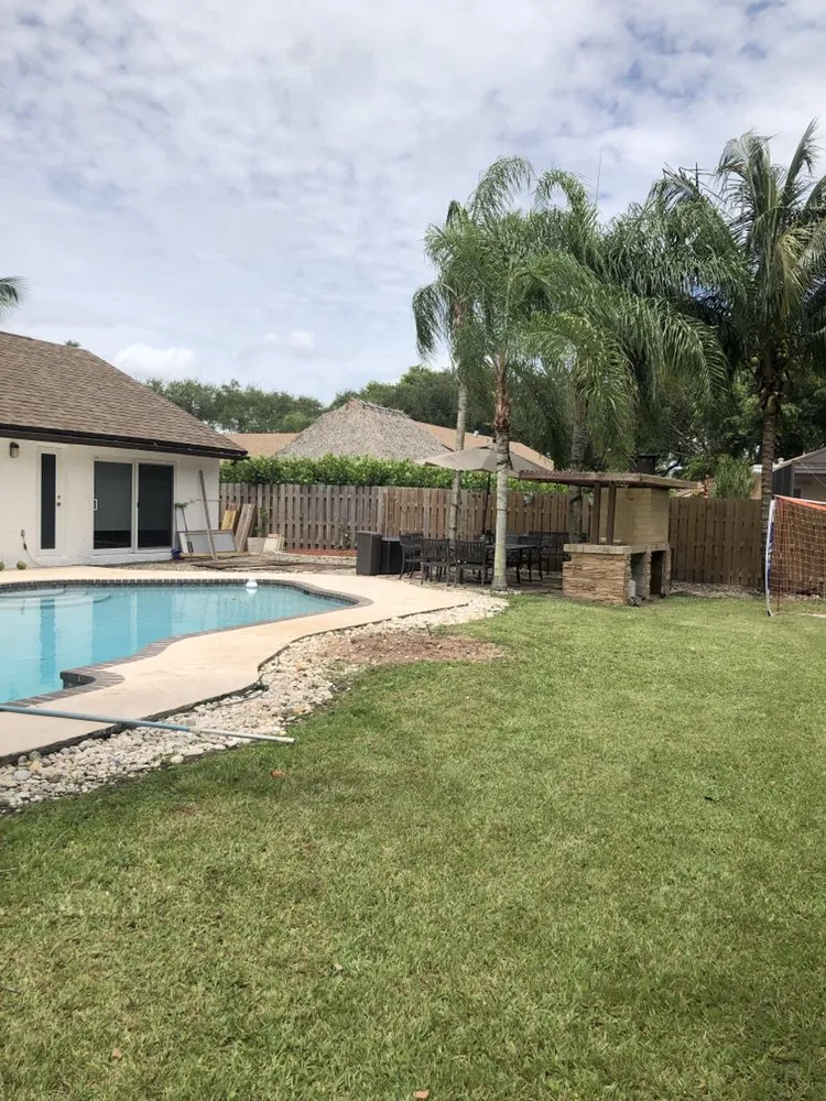 Local lawn mowing service for year-round maintenance in Hialeah, FL by E Flores Landscaping