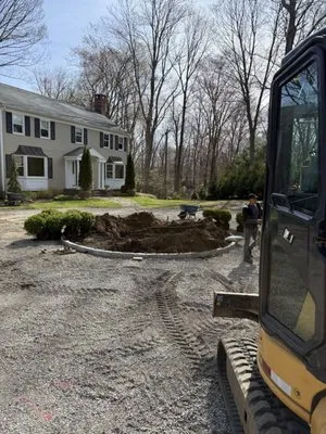 E H Landscaping & Masonry Logo