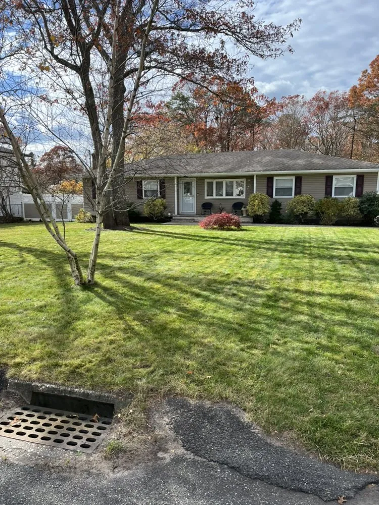 Custom landscape installation for homes in Mastic Beach, NY by E Lawn Care