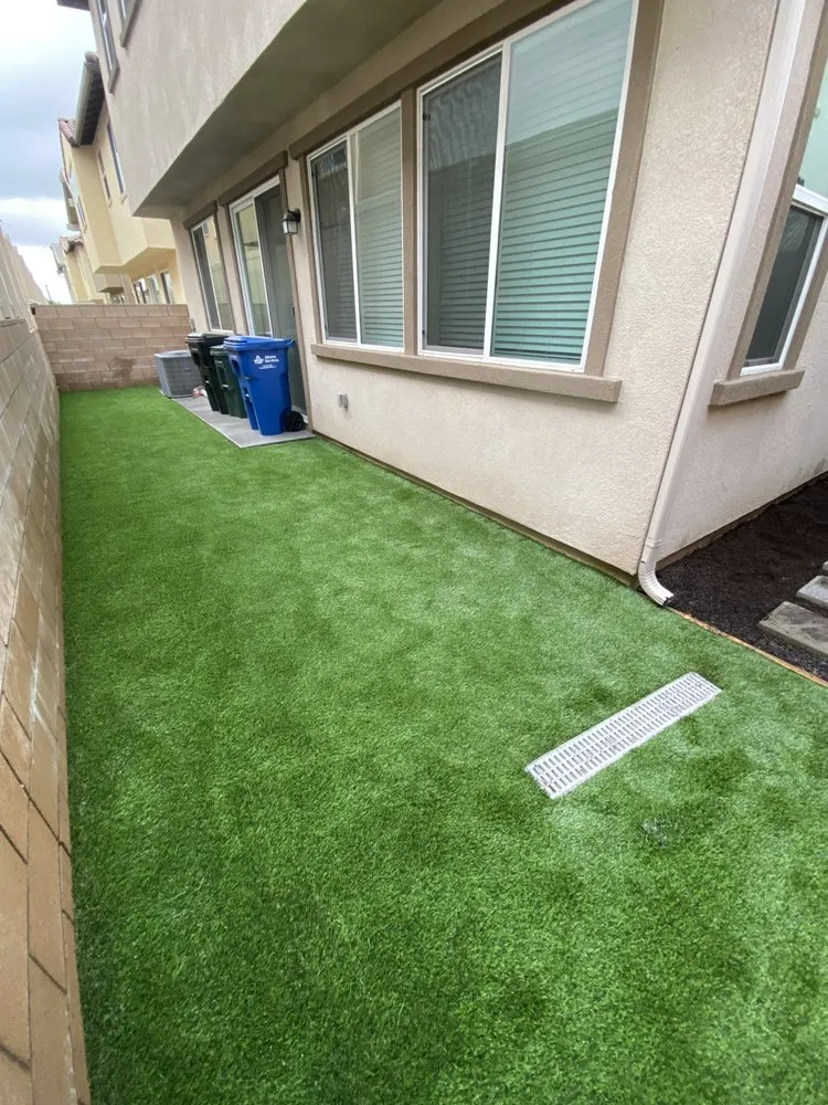Custom yard maintenance with custom design across Victorville, CA - E R Artificial Grass