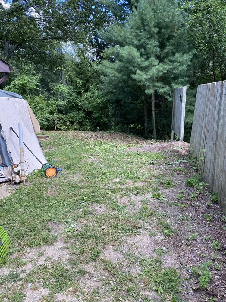 Professional lawn mowing service for residential properties in Howell, MI by E T Landscaping