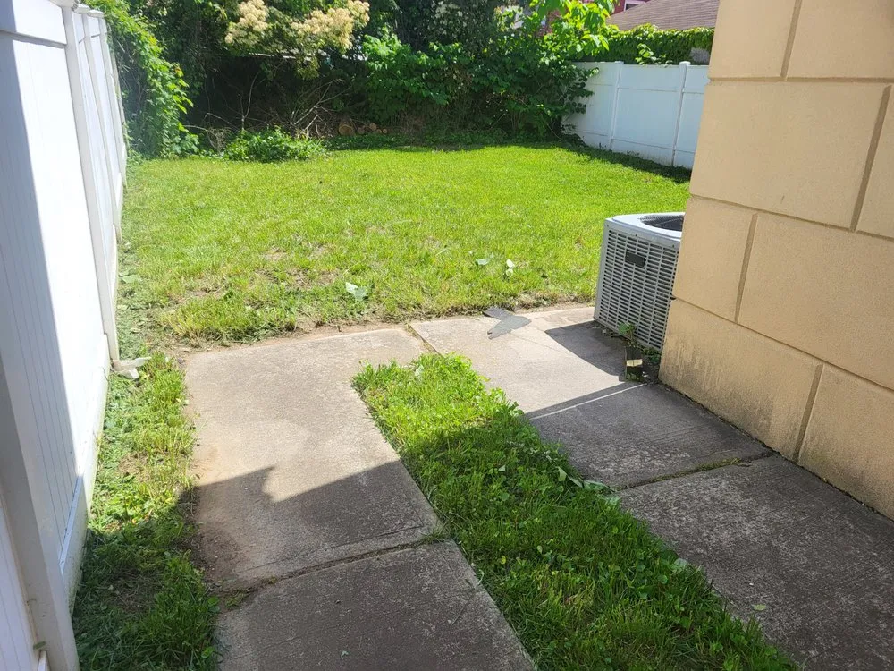 Affordable lawn mowing service for residential properties in Salem, NJ by E Ts Handy landscaping