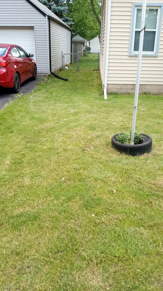 Custom landscape installation for residential properties across Rockford, IL - E&A Lawn Care Tree Care and More