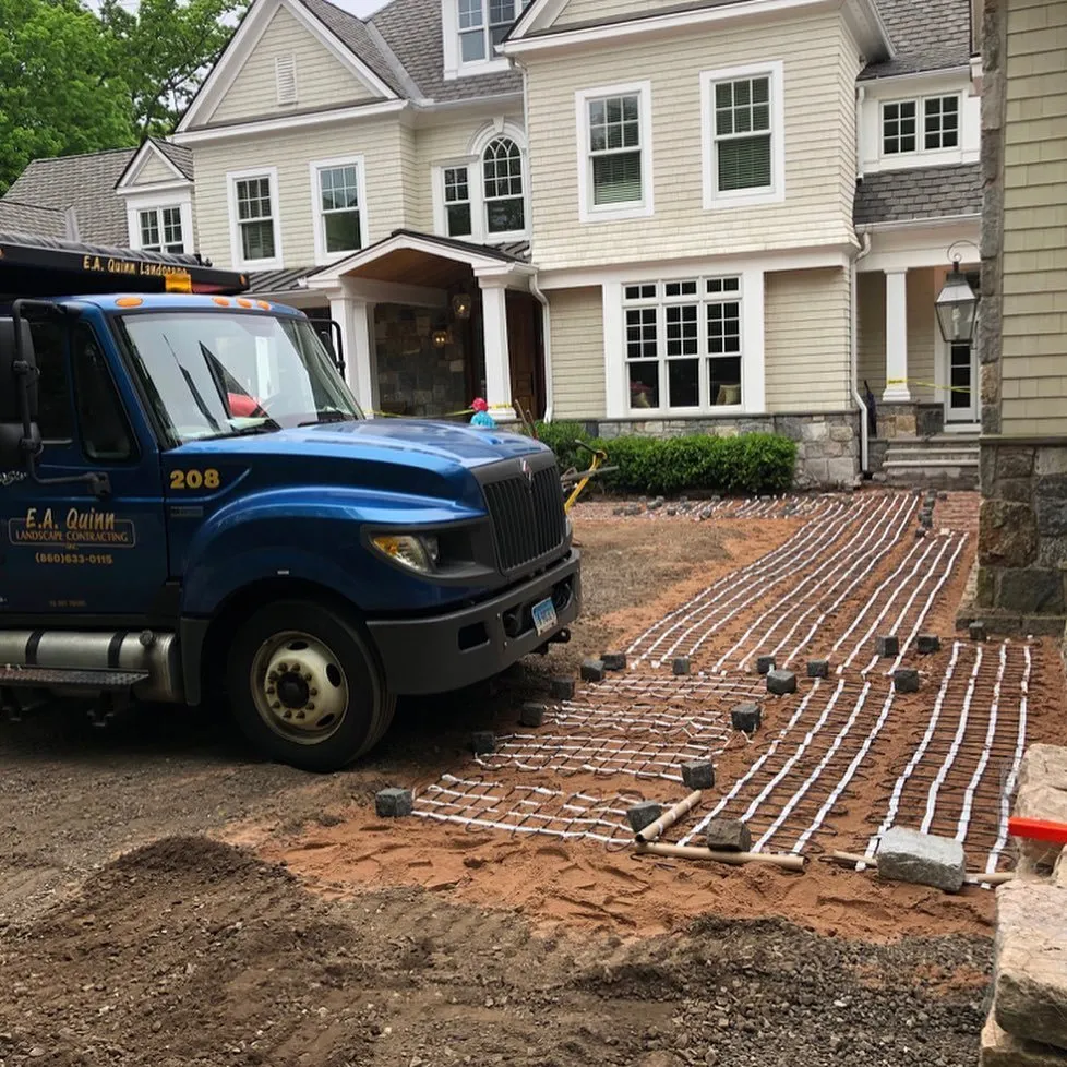 Professional landscaping services for year-round maintenance across Glastonbury, CT - E.A. Quinn Landscape Contracting