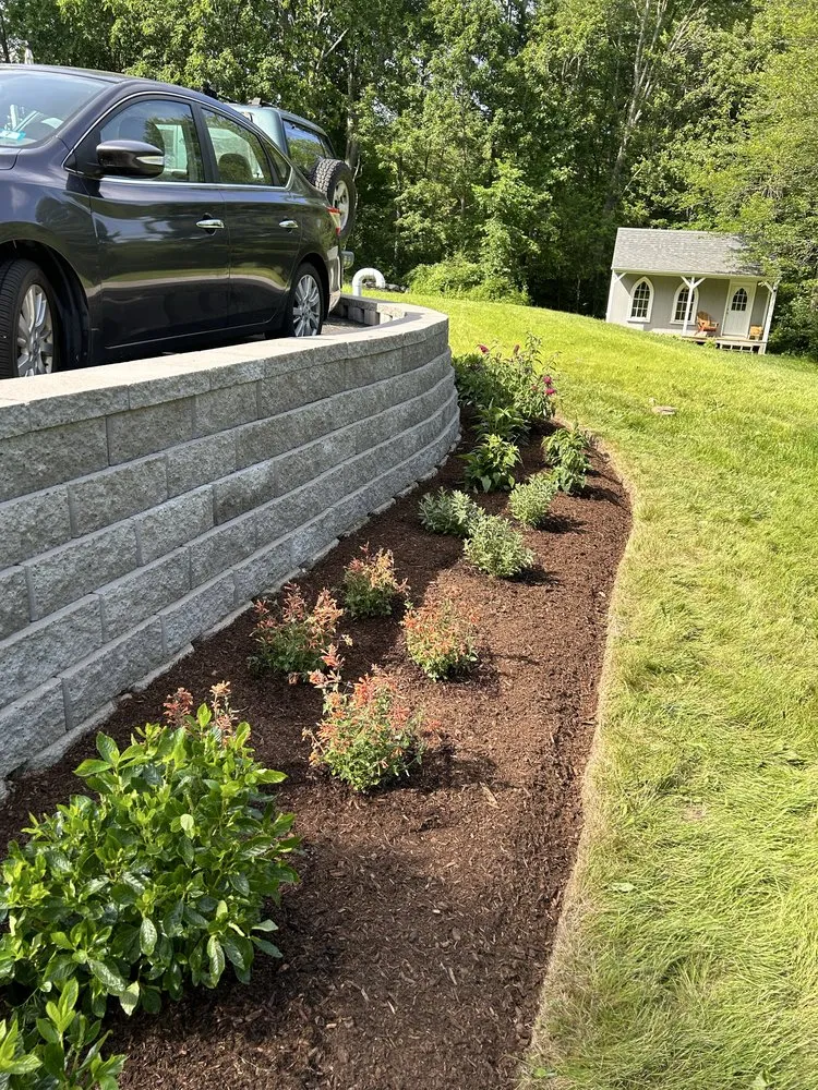 Trusted lawn mowing service with custom design in Manchester, NH by Eagle Landscaping & Hardscaping