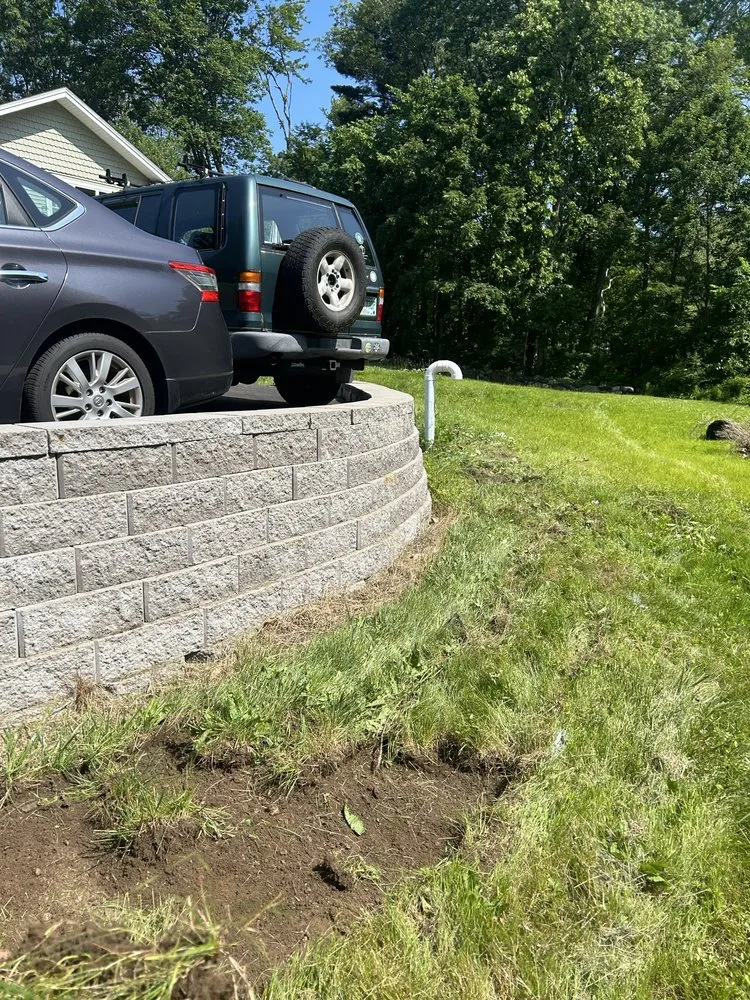 Affordable lawn mowing service for year-round maintenance in Manchester, NH by Eagle Landscaping & Hardscaping