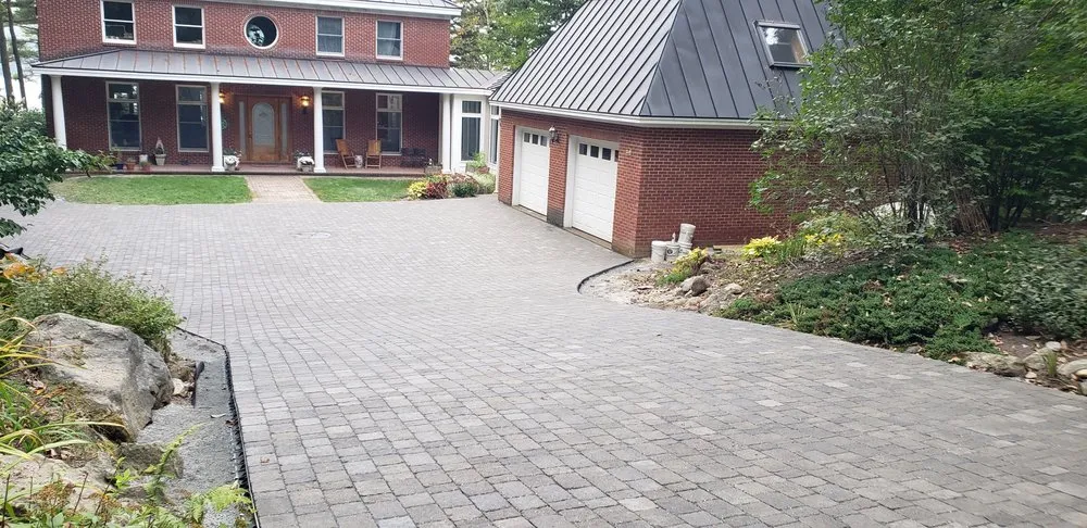 Affordable yard cleanup service for residential properties across Lewiston, ME - Earth & Turf Landscape Solutions