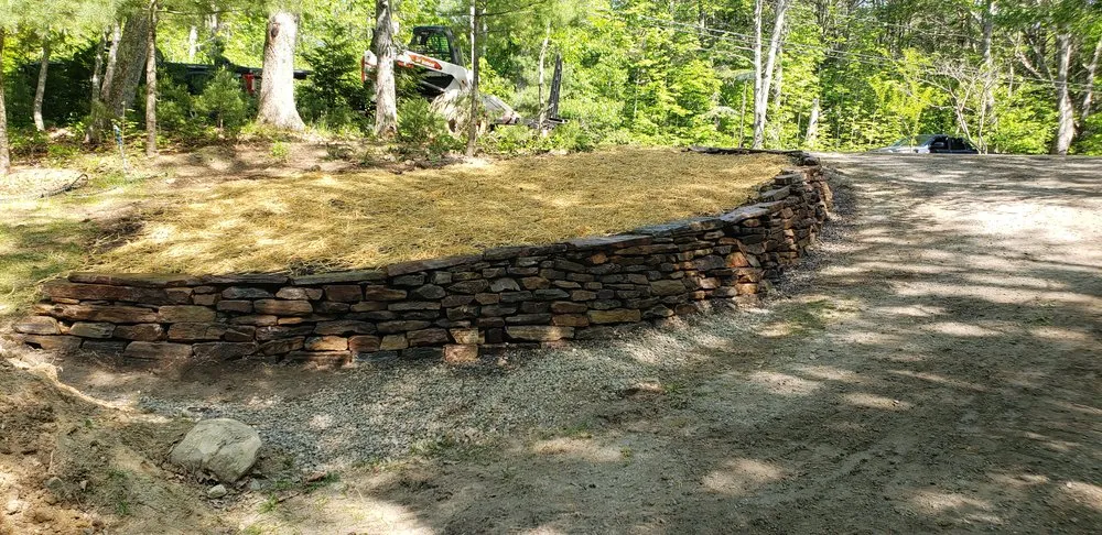 Local yard cleanup service with custom design across Lewiston, ME - Earth & Turf Landscape Solutions