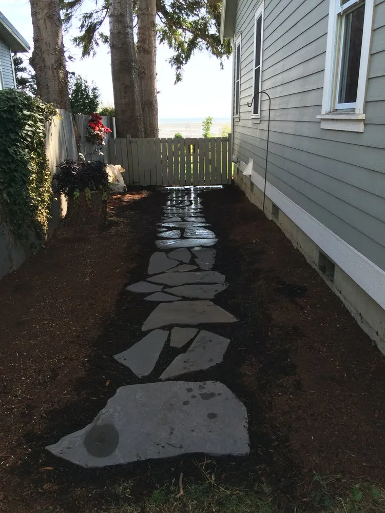 Expert lawn mowing service in Arlington, WA by Earth And Stone Landscaping