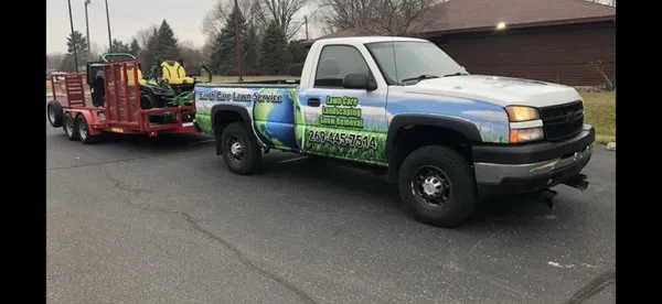 Earth Care Lawn Service Logo