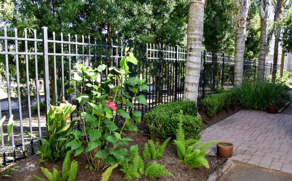 Custom garden landscaping for year-round maintenance in Galveston, TX by Earth Creations Landscaping