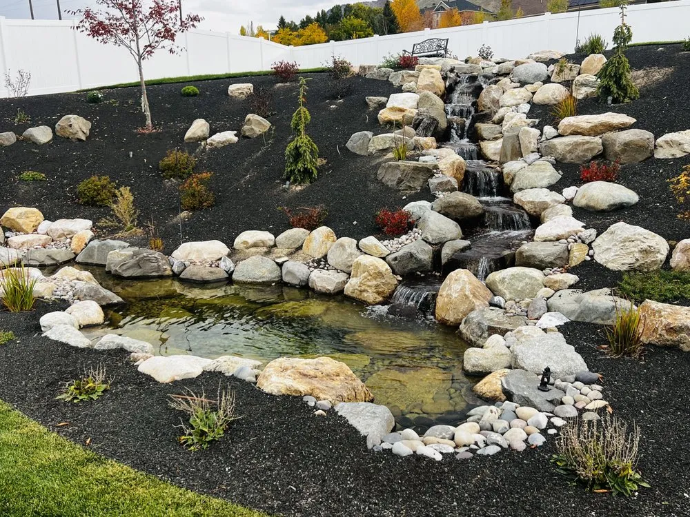 Custom landscape installation in Harrisville, UT by Earth Energy Waterscapes
