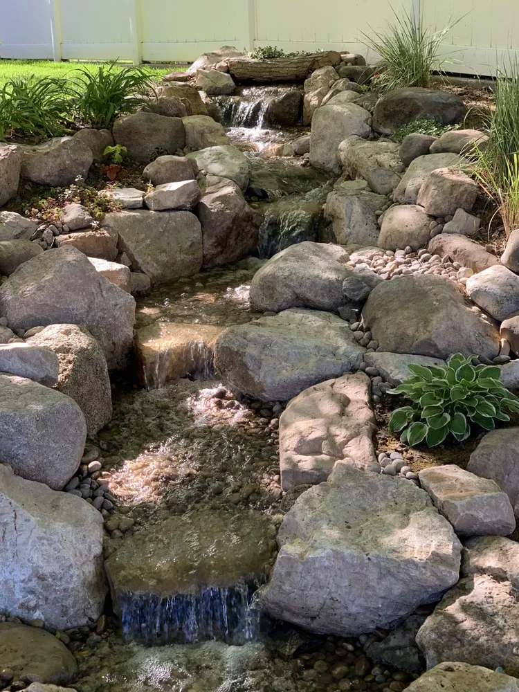 Custom yard maintenance in Harrisville, UT by Earth Energy Waterscapes