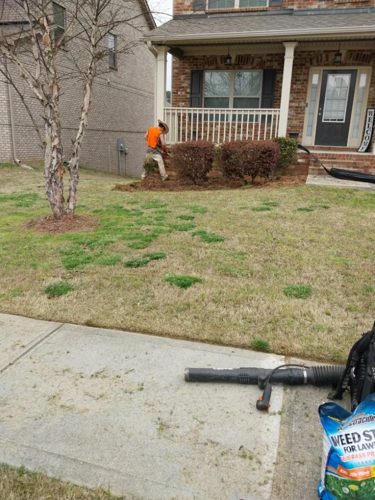 Affordable yard cleanup service for homes in Atlanta, GA by Earth Lawn and Landscaping