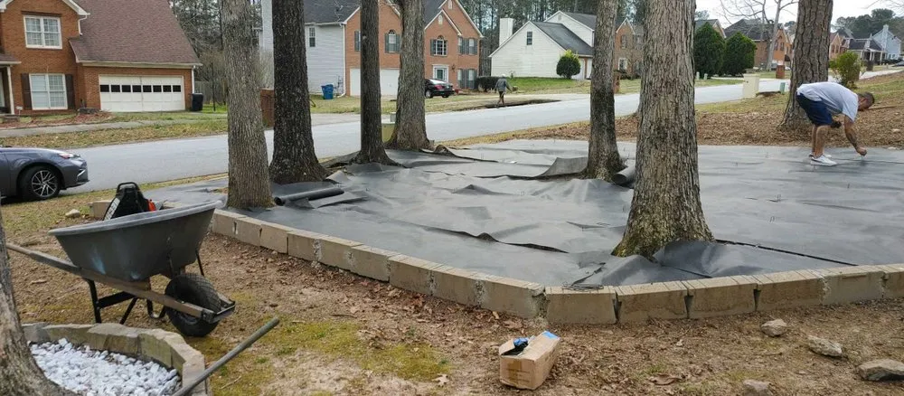 Professional landscape installation for residential properties in Flowery Branch, GA by Earth Lawn and Landscaping