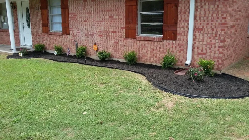 Professional lawn mowing service with custom design across Flowery Branch, GA - Earth Lawn and Landscaping