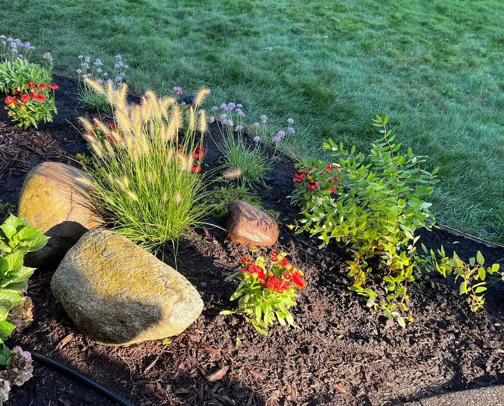 Local landscape installation for outdoor upgrades in Grand Haven, MI by Earth Stewards Lawn and Garden Services