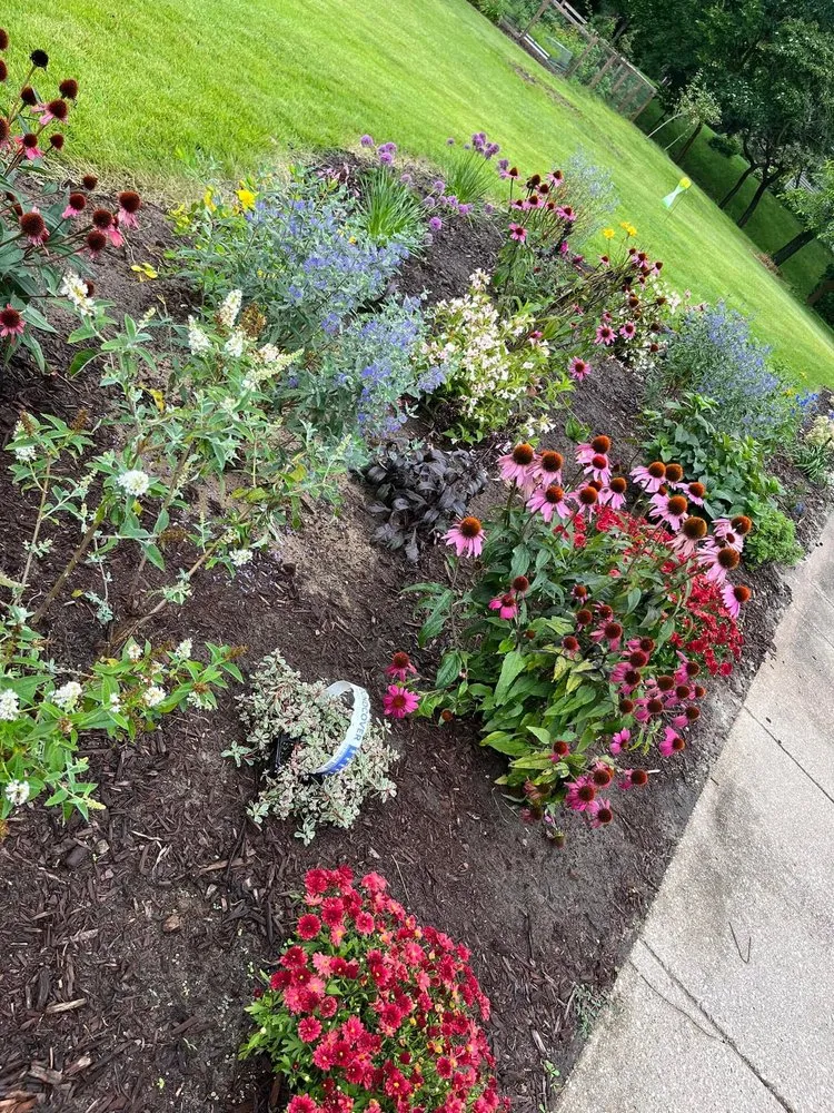 Custom yard cleanup service in Grand Haven, MI by Earth Stewards Lawn and Garden Services