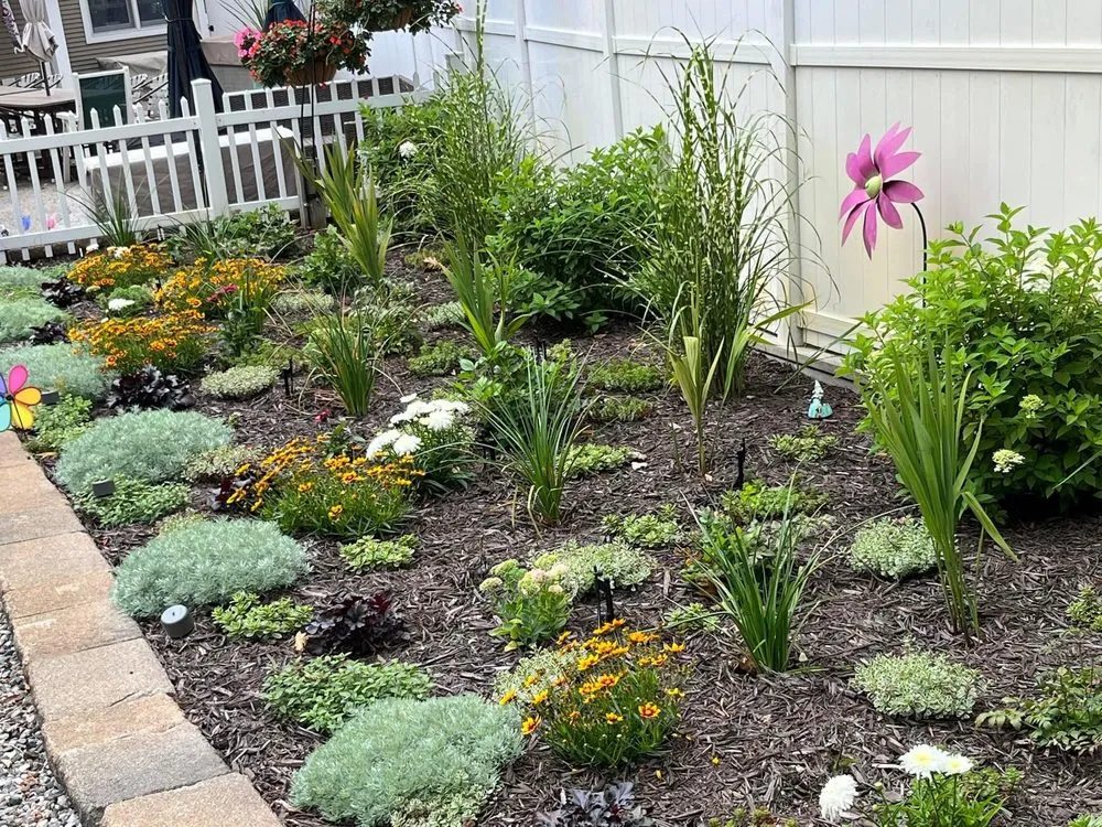 Reliable yard maintenance for homes across Grand Haven, MI - Earth Stewards Lawn and Garden Services