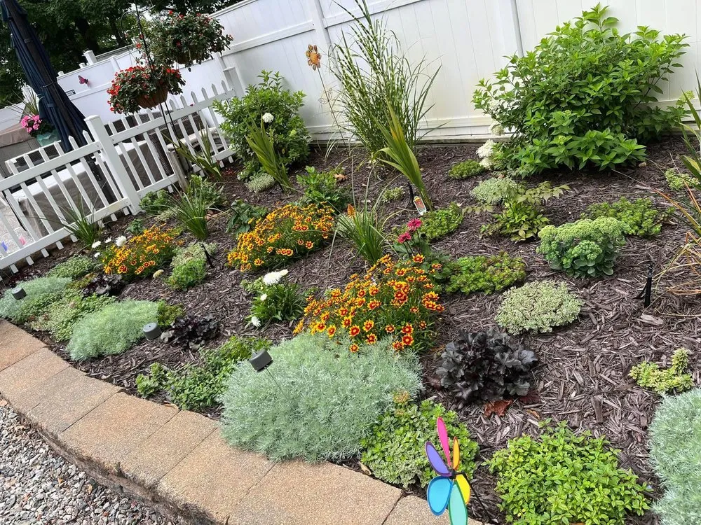 Affordable yard maintenance for year-round maintenance across Grand Haven, MI - Earth Stewards Lawn and Garden Services
