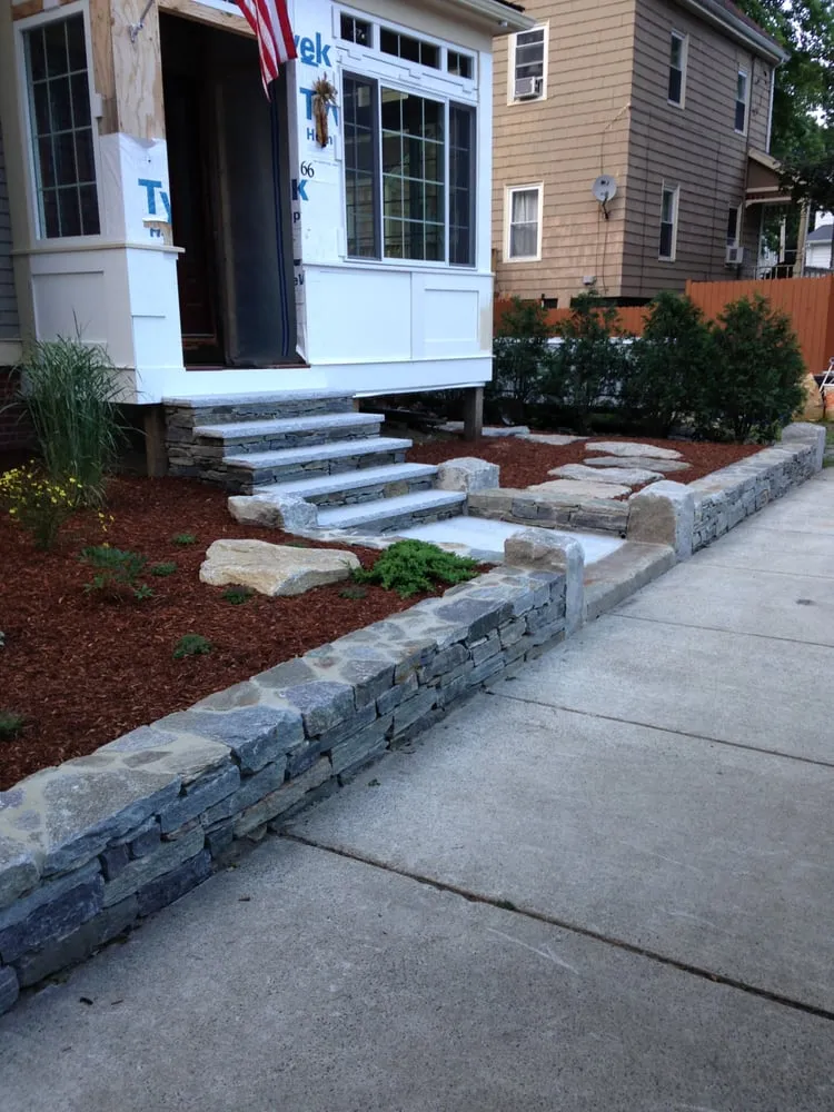 Top-rated lawn mowing service for beautiful yards across North Reading, MA - Earth Stone and Water