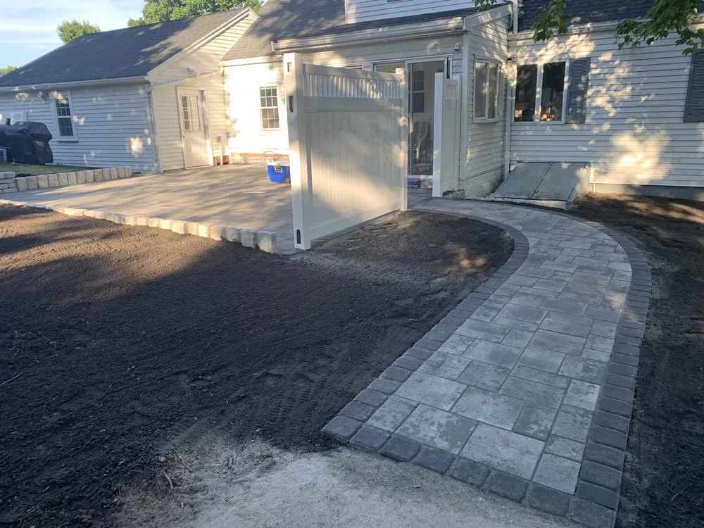 Local garden landscaping for year-round maintenance in North Reading, MA by Earth Stone and Water