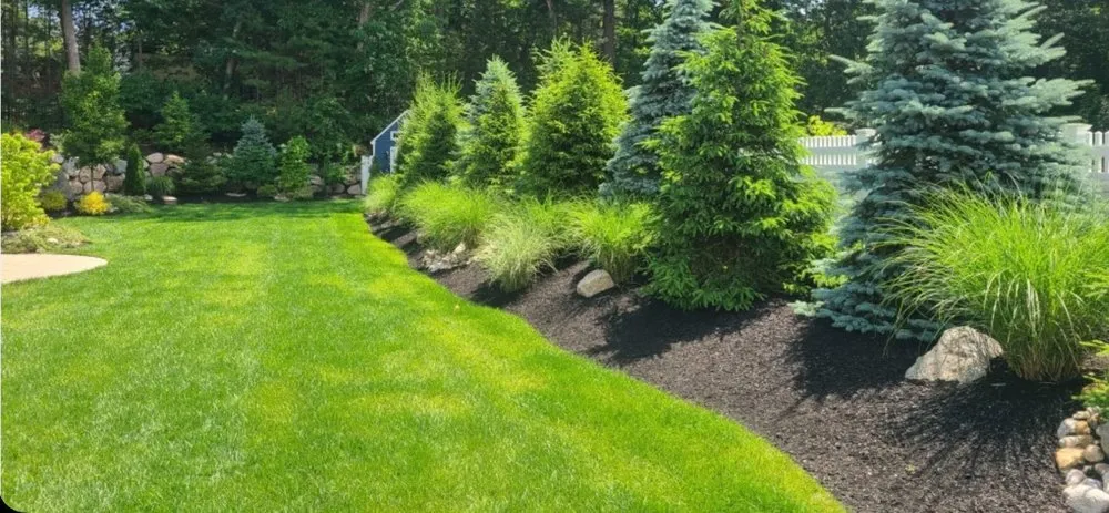 Professional lawn mowing service for year-round maintenance across North Andover, MA - Earth Works