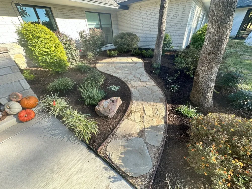 Affordable yard maintenance with custom design in Denton, TX by EarthAid Organics