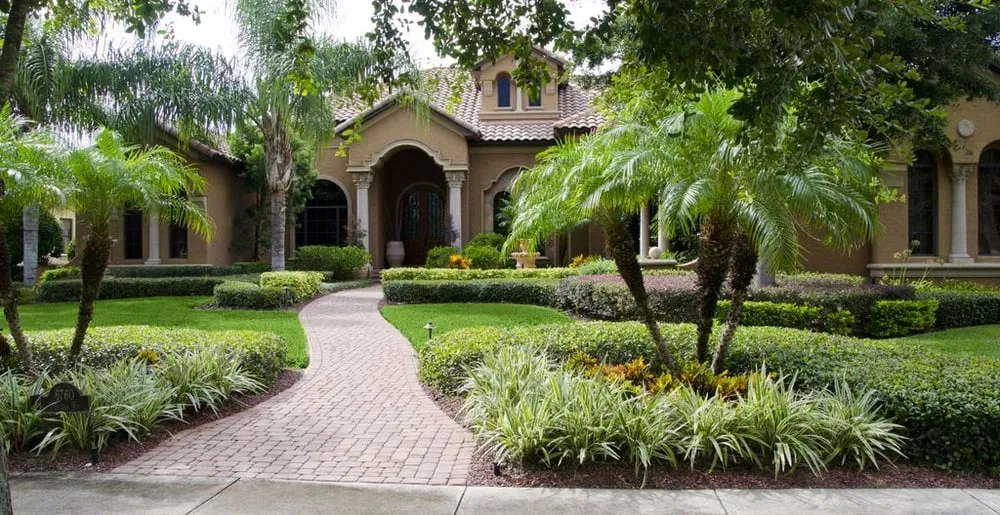 Top-rated landscape installation with custom design in Naples, FL by Earthcare Landscape Services