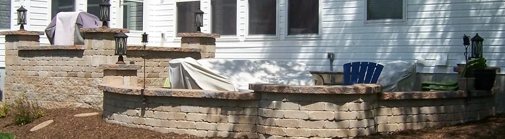 Affordable landscaping services for year-round maintenance in St. Louis, MO by Earthscapes & Construction