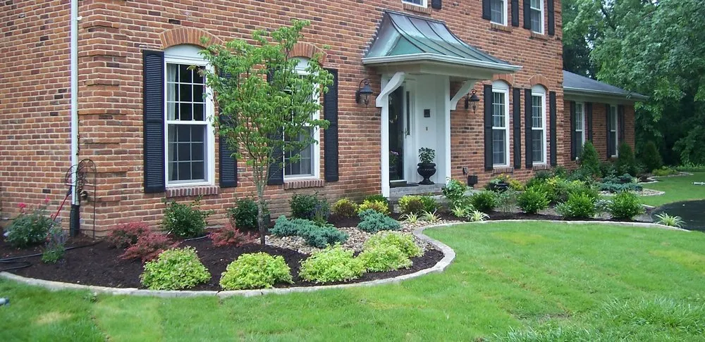 Professional lawn mowing service with custom design in St. Louis, MO by Earthscapes & Construction