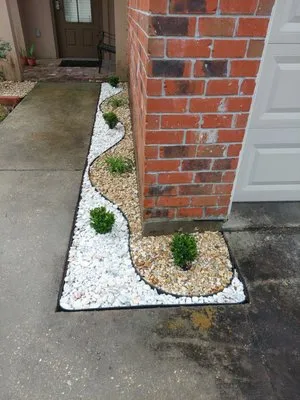 EarthScapings Landscaping & Outdoor Living Logo