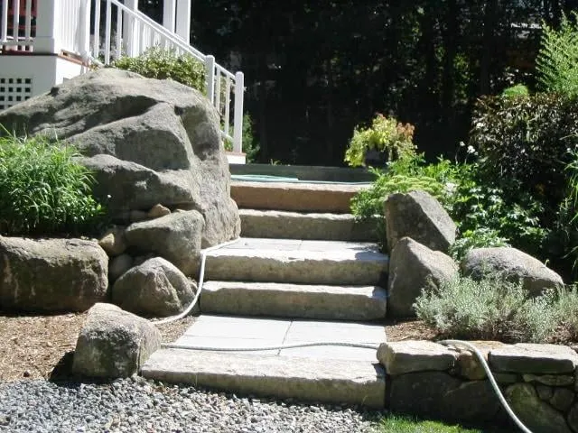 Professional landscape installation with custom design in Rockport, MA by Earthworks Constructors