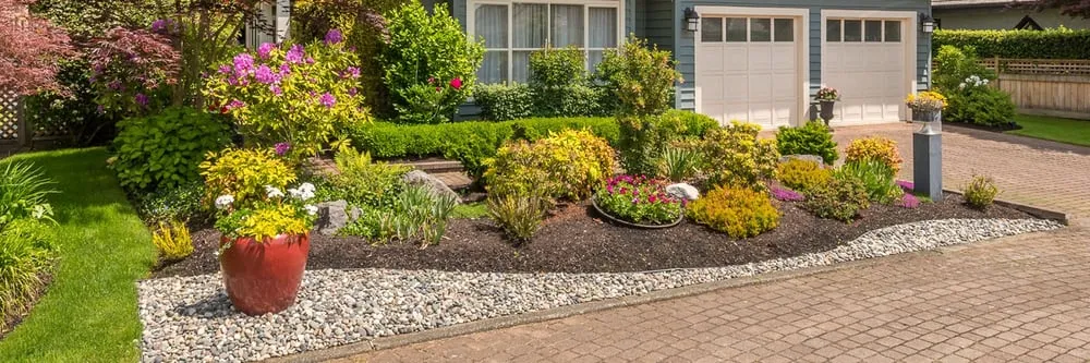 Professional yard maintenance for year-round maintenance across Box Elder, SD - Earthworks Landscaping