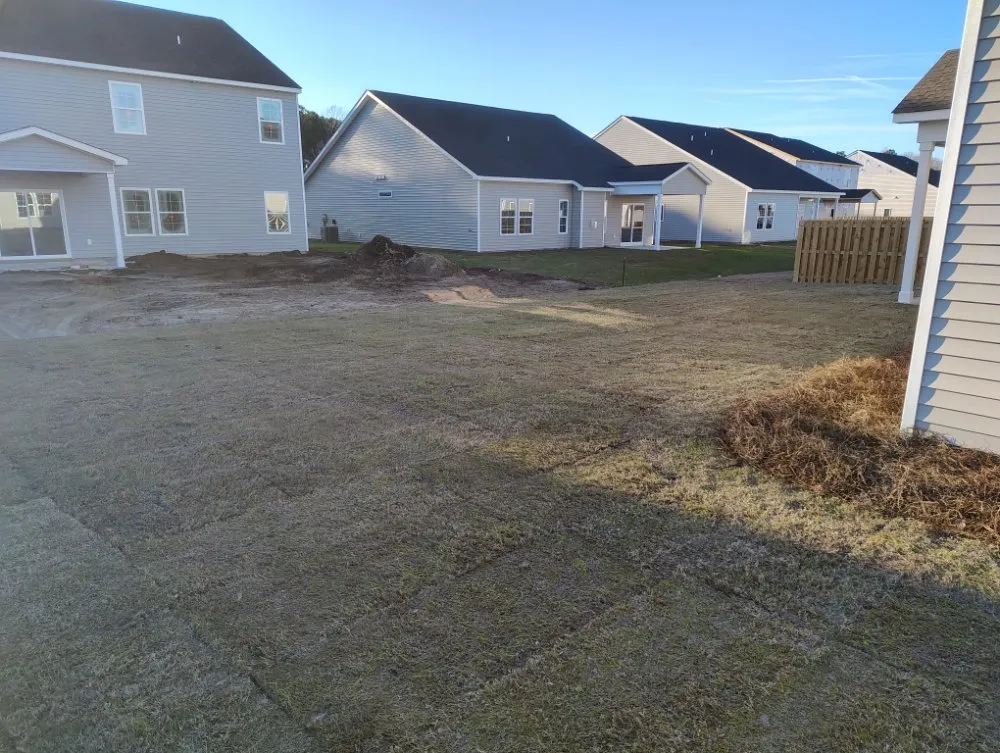 Professional lawn mowing service in Atkinson, NC by East Coast Landscapes and Concrete
