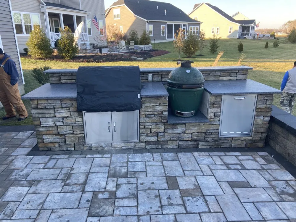 Custom outdoor landscaping for year-round maintenance in Millsboro, DE by East Coast Landscaping