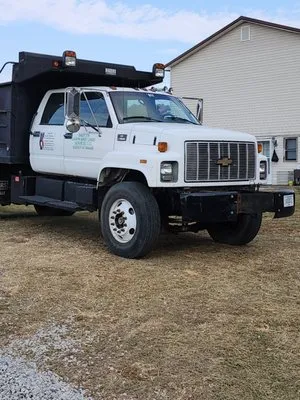 East TN Lawn and Land Services Logo