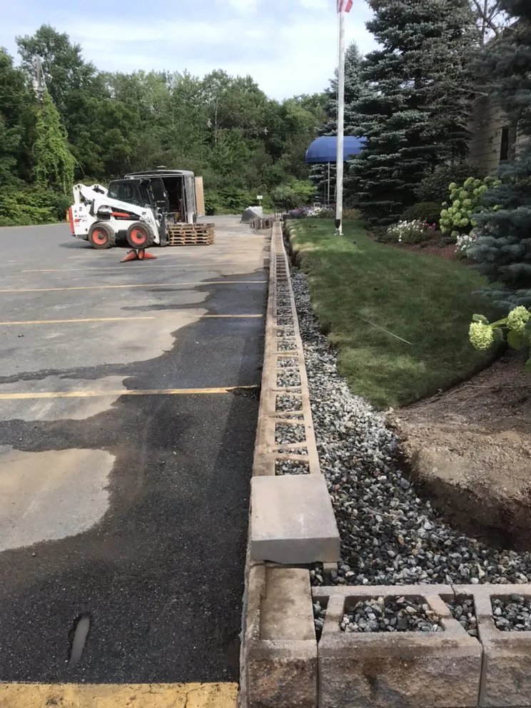 Affordable lawn mowing service for year-round maintenance in Beverly, MA by EastCoast Landscaping