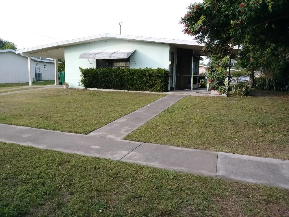 Professional landscaping services for homes across Pt Charlotte, FL - Easy Cut Blessing's