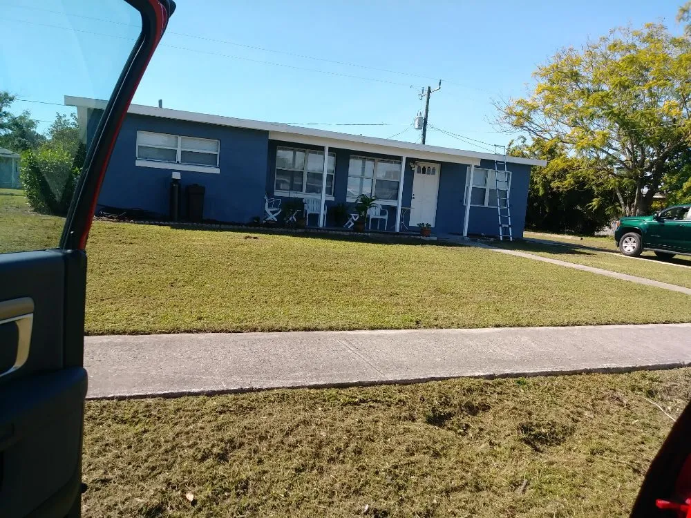 Affordable outdoor landscaping in Pt Charlotte, FL by Easy Cut Blessing's
