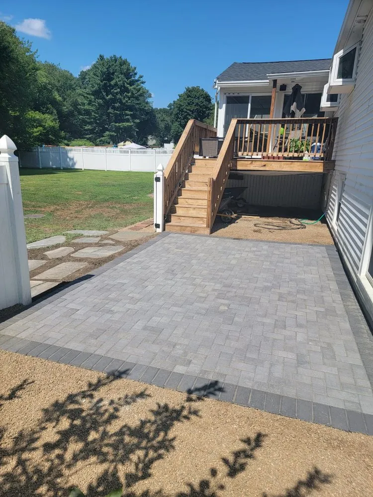 Professional landscape installation for residential properties in Lowell, MA by Easy Way Landscaping and Paving