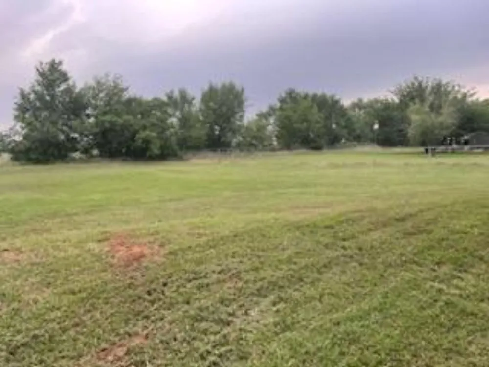 Expert lawn mowing service in Oklahoma City, OK by Eazy Care Landscaping