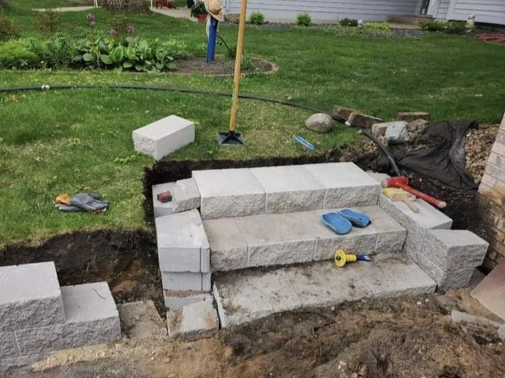 Local lawn care service with custom design in Topeka, KS by Eben_ Ezer Landscaping