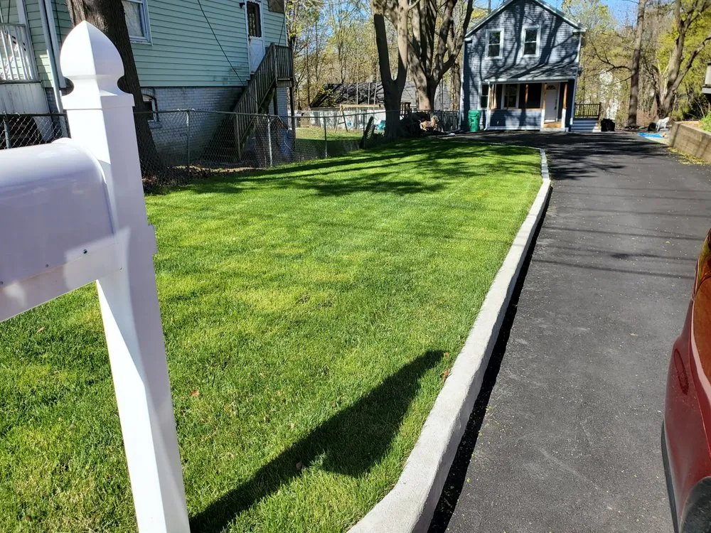 Custom lawn mowing service in Dudley, MA by Ebenezer Construction and Cleaning
