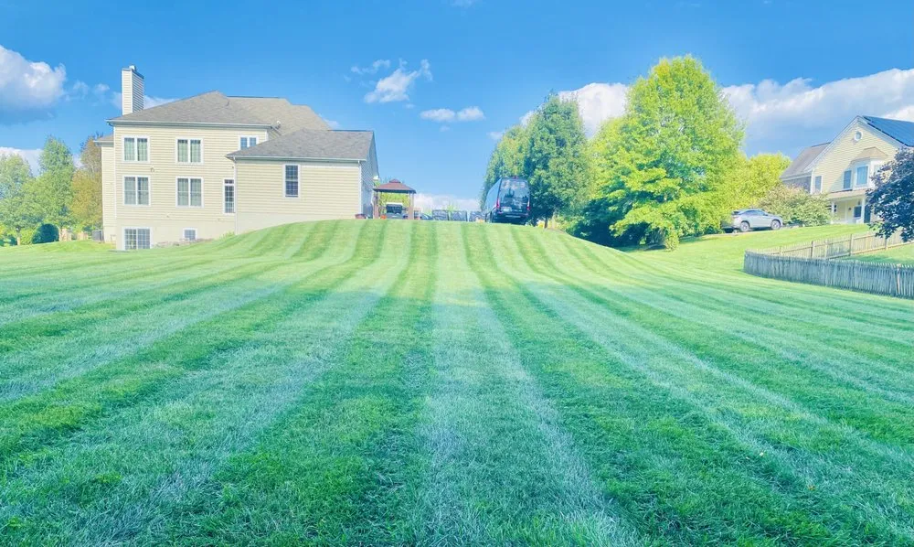 Expert lawn mowing service for homes in Reisterstown, MD by ECL Landscaping Service