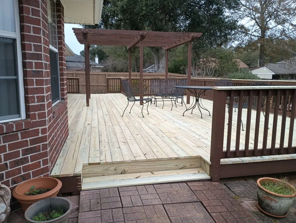 Custom yard maintenance with custom design in Pace, FL by Eco Heroes