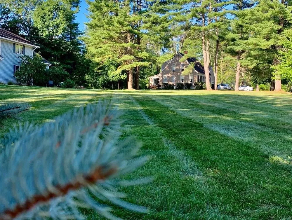 Professional lawn mowing service for year-round maintenance in Dover, NH by Eco Landscaping