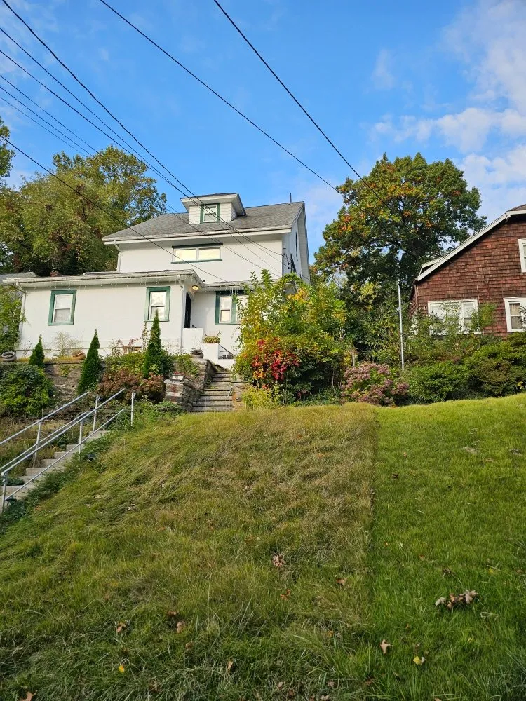 Trusted lawn mowing service for residential properties in Port Chester, NY by Eco Logical