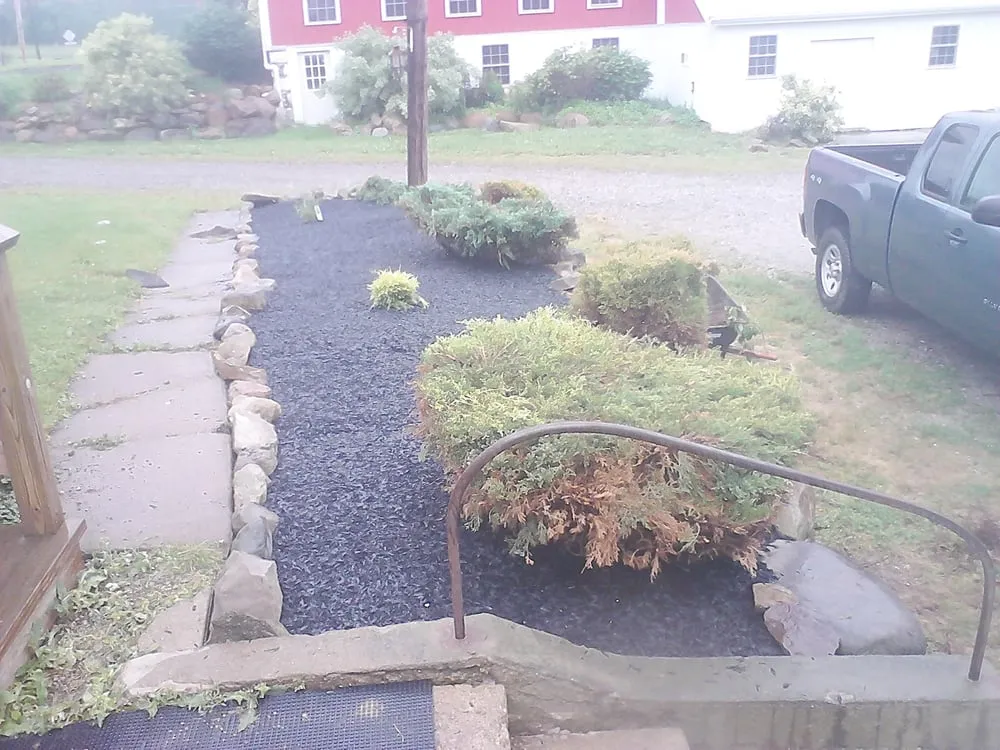 Professional outdoor landscaping with custom design in Mebane, NC by Eco-Smart Rubber Mulch Systems