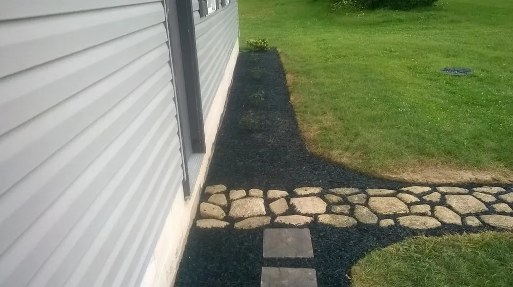 Trusted yard cleanup service in Mebane, NC by Eco-Smart Rubber Mulch Systems